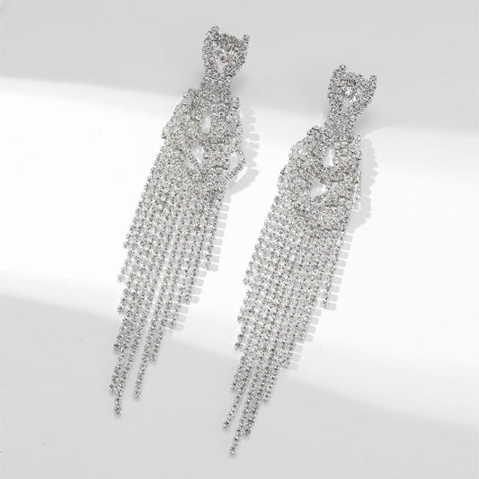 Full Diamond Long Tassel Women's Earrings $21.47 Dana Fashion Color: Golden AB Women's Accessories Product information: Color: gold, silver Applicable population: Female Material: Rhinestone Shape: Geometry Size: 12.8 * 1.8cm Packing list: Earrings*1Pair