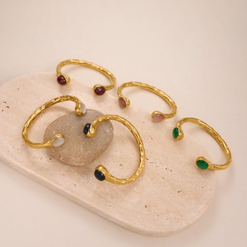 Genuine Gold Plated Titanium Steel Exquisite Zircon Opening Bracelet $35.00 Dana Fashion Color: Black Women's Accessories Product information: Process: Electroplating Color: white, black, red, green, pink Material: titanium steel Size: Opening Popular ele