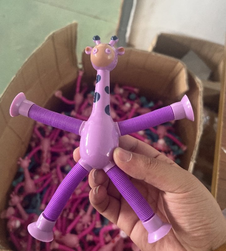Giraffe Tubes Sensory Toys Novelty Spring Fidget Toy Stretch Tube Stress Relief Toy For Kid Birthday Gift Party Favors $9.10 Dana Fashion Color: Purple style: With lights Baby & Mother Overview: 【4-in-1 Innovative Design】 These deformable fidget toys are