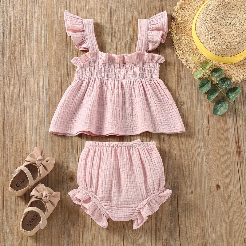 Girls' Solid Color Sling Top Hot Pants Suit $20.00 Dana Fashion Color: Green Suitable For Height: 100cm Baby Clothing Product information: Color: green, pink Pants length: Shorts Applicable height: 80cm,90cm,100cm,110cm,70cm Fabric name: Cotton Closed sty