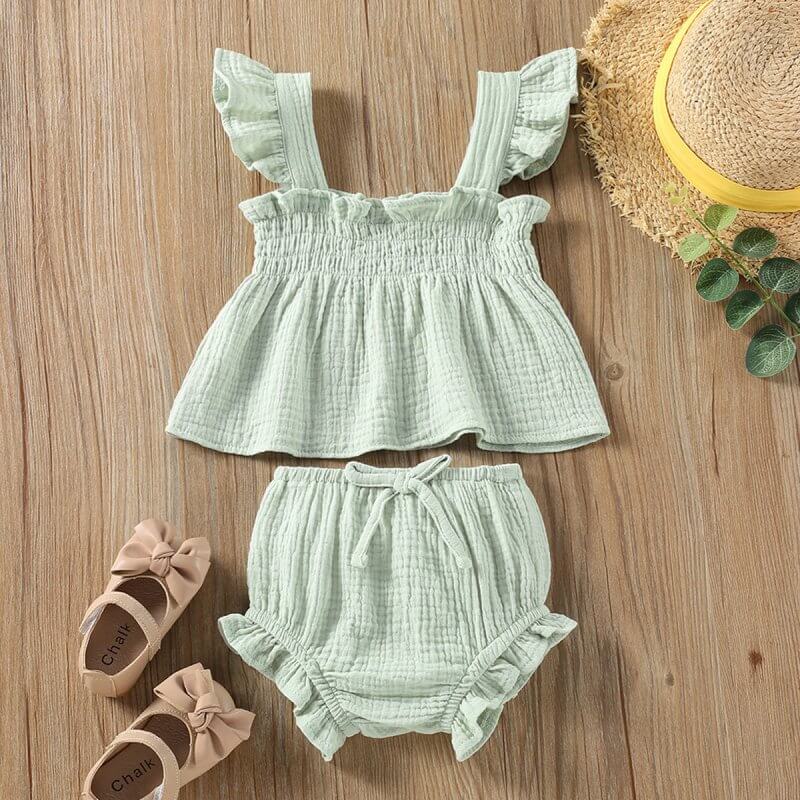 Girls' Solid Color Sling Top Hot Pants Suit $20.00 Dana Fashion Color: Green Suitable For Height: 100cm Baby Clothing Product information: Color: green, pink Pants length: Shorts Applicable height: 80cm,90cm,100cm,110cm,70cm Fabric name: Cotton Closed sty