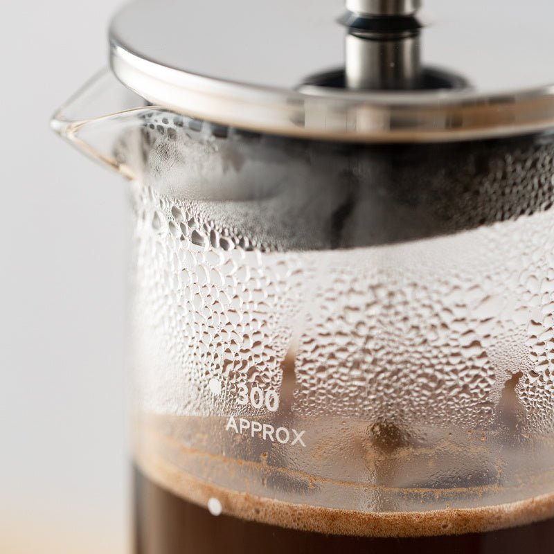 Glass Press Pot $32.35 Dana Fashion Color: Transparent Size: 350 ml Dana's Kitchen Model: CK8901 Material: Heat-resistant glass, stainless steel, PP, silicone Capacity: 350mL Color: black