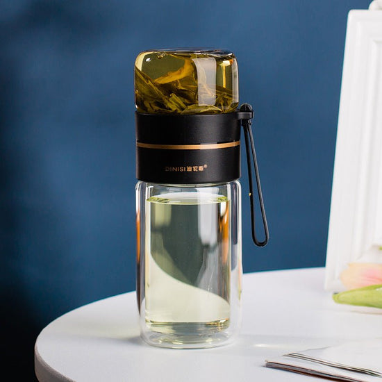 Glass Water Bottle With Tea Infuser Filter Tea Separation Double Wall Glass Bottle Leakproof Water Bottle $32.35 Dana Fashion Color: Black Capacity size: 400ml Dana's Kitchen Overview: 1. Tea water separation design, you can use the tea warehouse to make