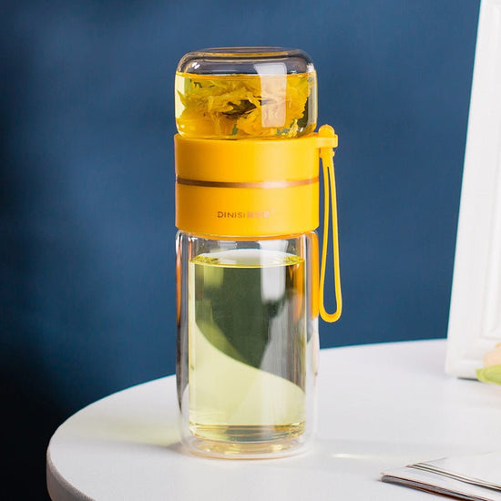 Glass Water Bottle With Tea Infuser Filter Tea Separation Double Wall Glass Bottle Leakproof Water Bottle $31.44 Dana Fashion Color: Yellow Capacity size: 400ml Dana's Kitchen Overview: 1. Tea water separation design, you can use the tea warehouse to make