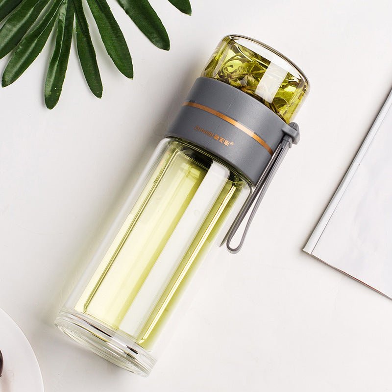 Glass Water Bottle With Tea Infuser Filter Tea Separation Double Wall Glass Bottle Leakproof Water Bottle $32.62 Dana Fashion Color: Grey Capacity size: 450ml Dana's Kitchen Overview: 1. Tea water separation design, you can use the tea warehouse to make t