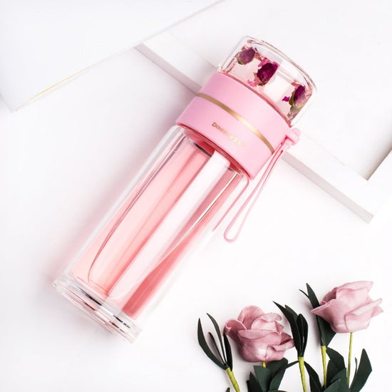 Glass Water Bottle With Tea Infuser Filter Tea Separation Double Wall Glass Bottle Leakproof Water Bottle $32.62 Dana Fashion Color: Pink Capacity size: 450ml Dana's Kitchen Overview: 1. Tea water separation design, you can use the tea warehouse to make t