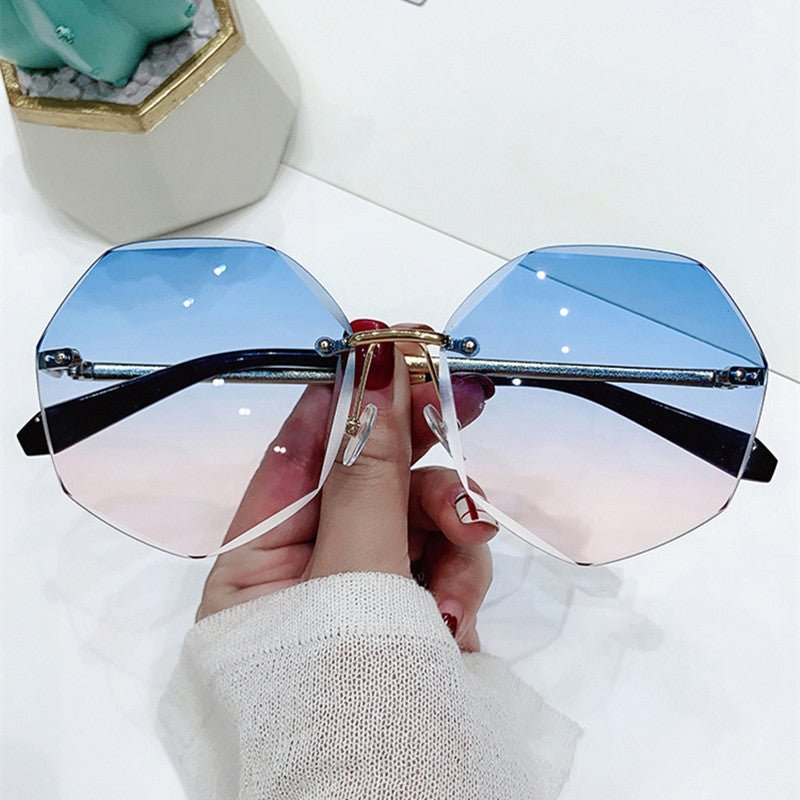 Glasses Cut-edge Sunglasses Polygonal Ladies Sunglasses $19.00 Dana Fashion Color: Blue powder Women's Accessories Product information: Glasses structure: frame Whether it is polarized: No Lens material: TAC Frame material: metal Style: Female Strength: s