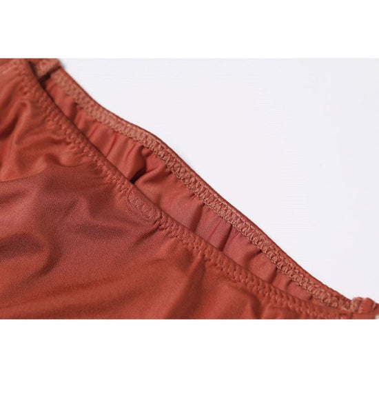 Glossy Thin Belt Hip-Lifting Sports Fitness Underwear Women $29.50 Dana Fashion Color: Black Size: L Women's clothing Specification: Function: Hip lift Material: Polyester fiber (polyester) Style: Sexy Waist type: High waist Clothing style details: Diamon