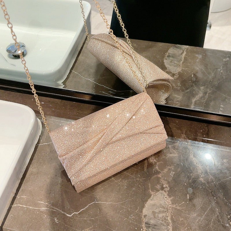 Gold Fashion Envelope Clutch $36.26 Dana Fashion Color: Cross Pouch Women's Bags Product information: Lining texture: Polyester Color: Cross pouch Hardness: hard Material: PU Suitcase shape: Horizontal Square Package internal structure: mobile phone bag P