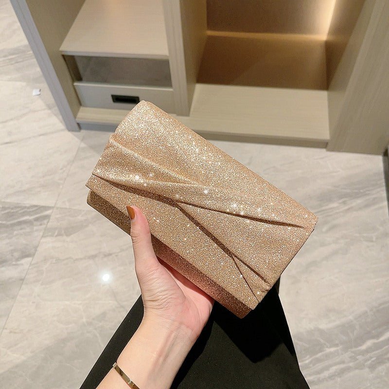 Gold Fashion Envelope Clutch $36.26 Dana Fashion Color: Cross Pouch Women's Bags Product information: Lining texture: Polyester Color: Cross pouch Hardness: hard Material: PU Suitcase shape: Horizontal Square Package internal structure: mobile phone bag P