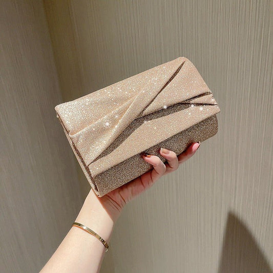 Gold Fashion Envelope Clutch $36.26 Dana Fashion Color: Cross Pouch Women's Bags Product information: Lining texture: Polyester Color: Cross pouch Hardness: hard Material: PU Suitcase shape: Horizontal Square Package internal structure: mobile phone bag P