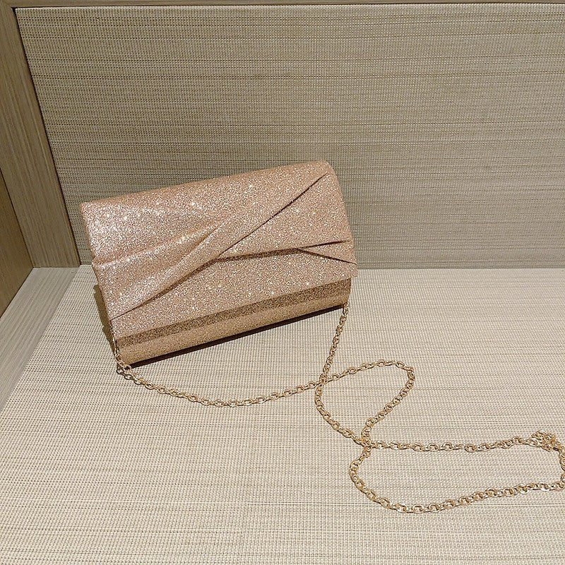 Gold Fashion Envelope Clutch $36.26 Dana Fashion Color: Cross Pouch Women's Bags Product information: Lining texture: Polyester Color: Cross pouch Hardness: hard Material: PU Suitcase shape: Horizontal Square Package internal structure: mobile phone bag P