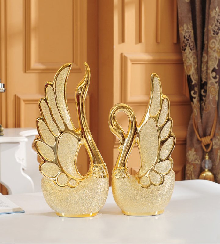 Gold-plated swan ornaments $79.00 Dana Fashion Color: Golden Size: S Dana's Kitchen Material: white porcelain Process: electroplating Surface technology: electroplating