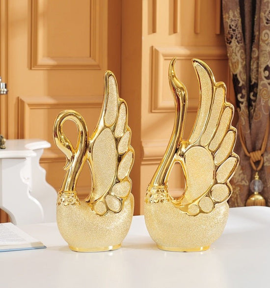 Gold-plated swan ornaments $79.00 Dana Fashion Color: Golden Size: S Dana's Kitchen Material: white porcelain Process: electroplating Surface technology: electroplating