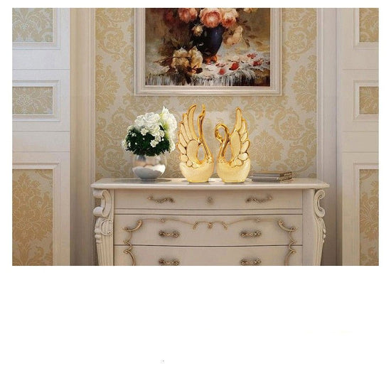 Gold-plated swan ornaments $79.00 Dana Fashion Color: Golden Size: S Dana's Kitchen Material: white porcelain Process: electroplating Surface technology: electroplating