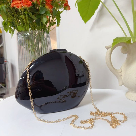 Golden Acrylic Metallic Goose Egg Box Banquet Clutch $37.31 Dana Fashion Color: Black Size: 21 x 5 x 15cm Women's Bags Product information: Color: gold (with lining), silver (with lining), Daikin color (with lining), large silver (with lining) Outer bag t