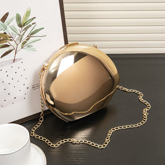 Golden Acrylic Metallic Goose Egg Box Banquet Clutch $37.31 Dana Fashion Color: Black Size: 21 x 5 x 15cm Women's Bags Product information: Color: gold (with lining), silver (with lining), Daikin color (with lining), large silver (with lining) Outer bag t