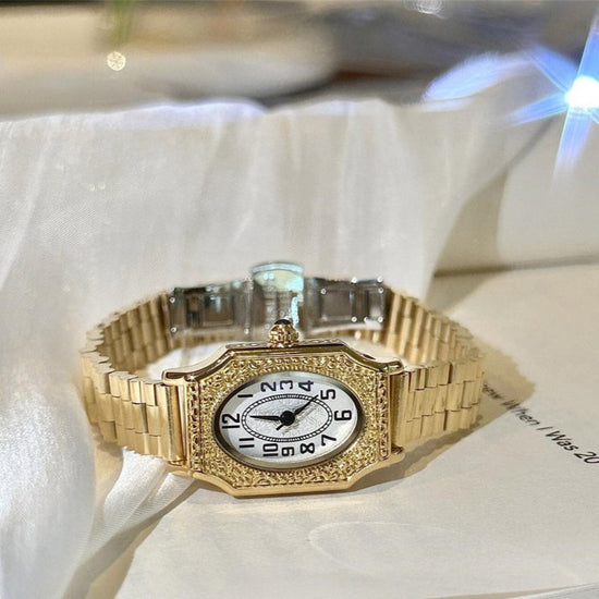 Good-looking Steel Belt Artistic Design Carved Retro Style Small Watch For Women $54.00 Dana Fashion Color: Gold Strap Gold Noodles Women's Accessories Product information: Color: Silver Streak white noodles, gold strap white noodles, gold strap gold nood