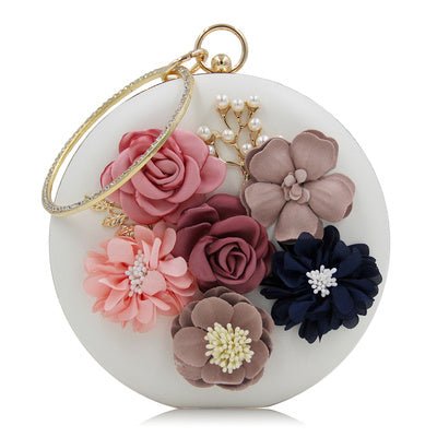 Gorgeous Round Clutches - RED $85.00 Dana Fashion Color: White Women's Bags Texture: PU material Process: artificial leather Closed way: lock pattern: plain Style: European and American Fashion shape: round box Condition: New Popular elements: flowers siz