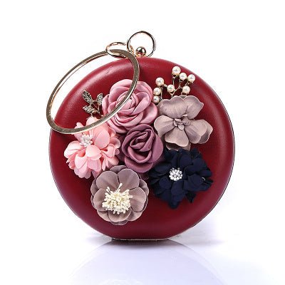 Gorgeous Round Clutches - RED $85.00 Dana Fashion Color: Wine Red Women's Bags Texture: PU material Process: artificial leather Closed way: lock pattern: plain Style: European and American Fashion shape: round box Condition: New Popular elements: flowers