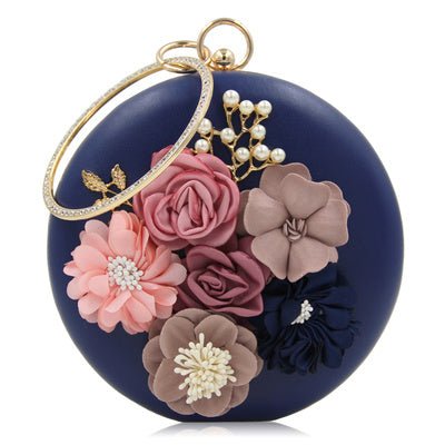 Gorgeous Round Clutches - RED $85.00 Dana Fashion Color: Navy Blue Women's Bags Texture: PU material Process: artificial leather Closed way: lock pattern: plain Style: European and American Fashion shape: round box Condition: New Popular elements: flowers