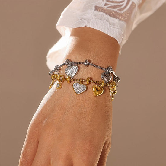Graceful Personality Heart Shape With Diamond Bracelet Titanium Steel $36.61 Dana Fashion Color: Gold Women's Accessories Product information: Color: E560-steel heart bracelet, E560-gold heart bracelet Applicable people: Unisex Material: titanium steel Sh
