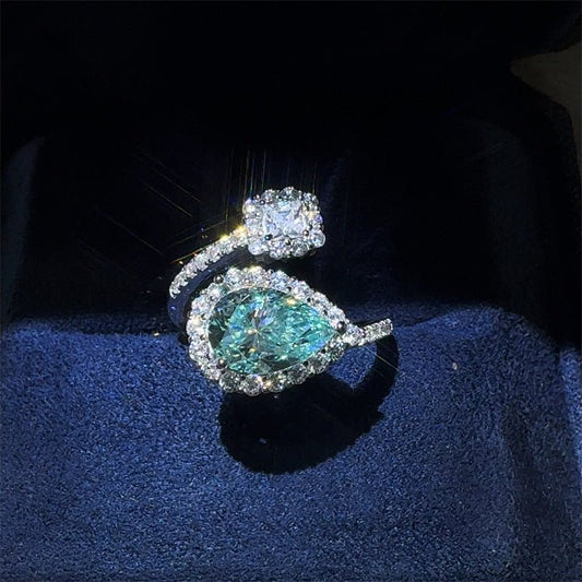 Green Drip 2 Karat Moissanite Women's Ring $149.00 Dana Fashion Color: 2 Karat Green Size: No 10 Women's Accessories Product information: Type: Ring Treatment Process: Diamond Color: 2 karat green water drops moissanite ring Applicable people: women Size: