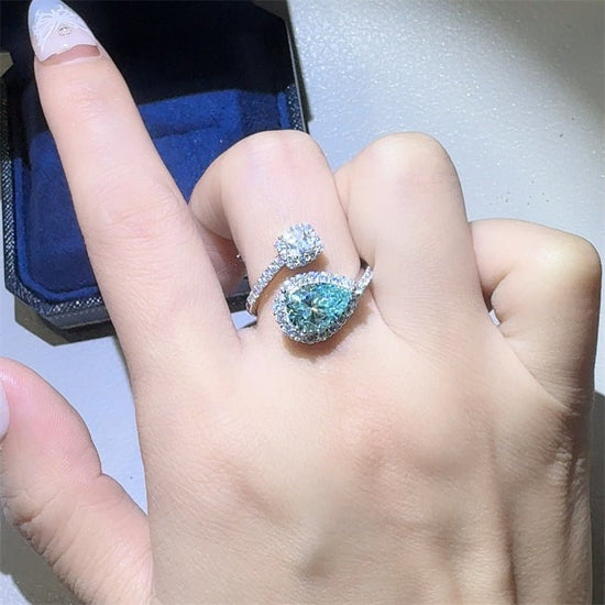 Green Drip 2 Karat Moissanite Women's Ring $149.00 Dana Fashion Color: 2 Karat Green Size: No 10 Women's Accessories Product information: Type: Ring Treatment Process: Diamond Color: 2 karat green water drops moissanite ring Applicable people: women Size: