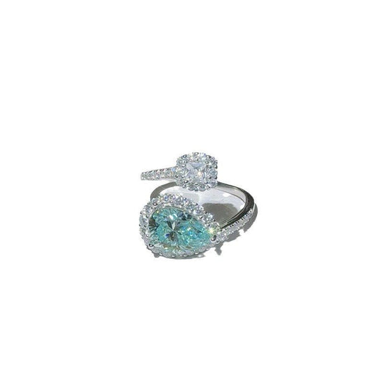 Green Drip 2 Karat Moissanite Women's Ring $149.00 Dana Fashion Color: 2 Karat Green Size: No 10 Women's Accessories Product information: Type: Ring Treatment Process: Diamond Color: 2 karat green water drops moissanite ring Applicable people: women Size: