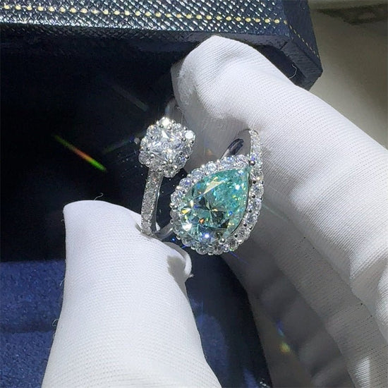 Green Drip 2 Karat Moissanite Women's Ring $149.00 Dana Fashion Color: 2 Karat Green Size: No 10 Women's Accessories Product information: Type: Ring Treatment Process: Diamond Color: 2 karat green water drops moissanite ring Applicable people: women Size: