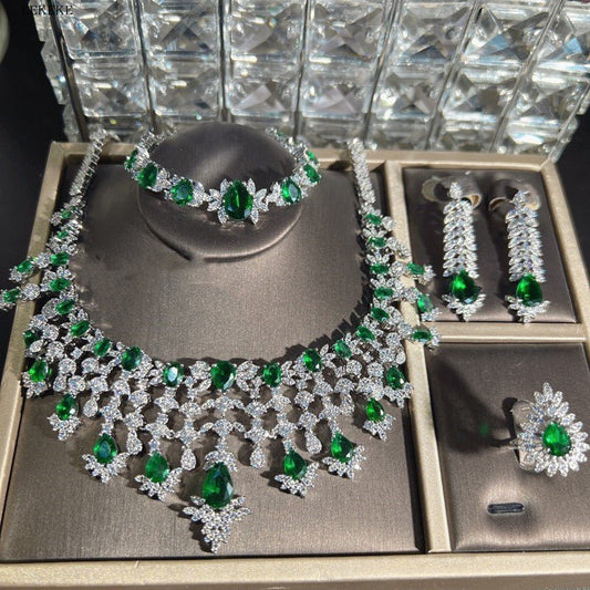 Green Waterdrops Zircon Necklace Earring Ring Bracelet Four-piece Set $362.50 Dana Fashion Color: Emerald Green Women's Accessories Product information: Material: zircon/Rhinestone Product Type: Ornament Color classification: Emerald Green Size: Necklace