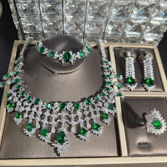 Green Waterdrops Zircon Necklace Earring Ring Bracelet Four-piece Set $362.50 Dana Fashion Color: Emerald Green Women's Accessories Product information: Material: zircon/Rhinestone Product Type: Ornament Color classification: Emerald Green Size: Necklace