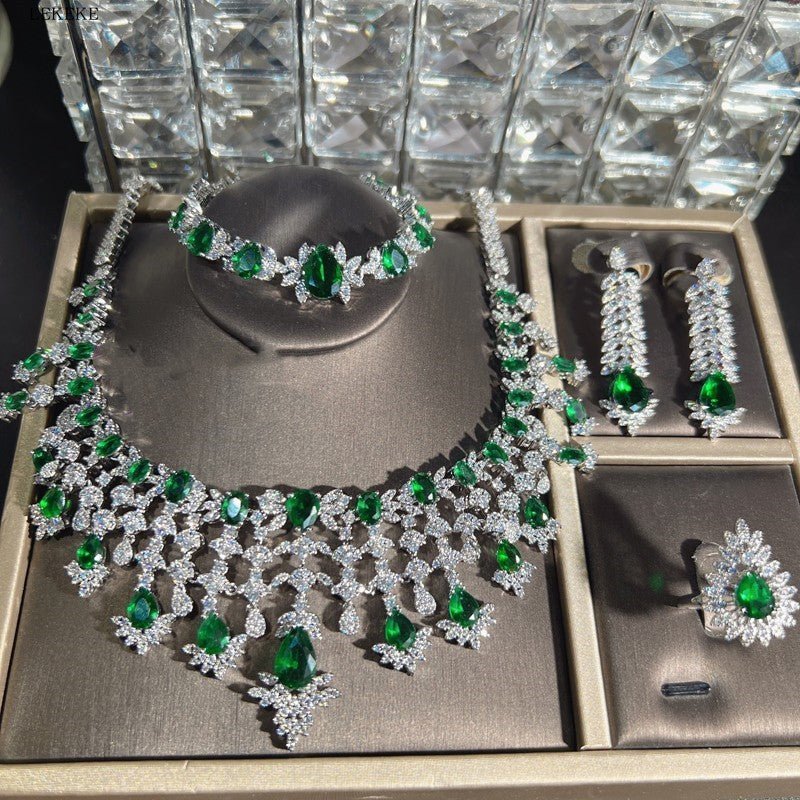 Green Waterdrops Zircon Necklace Earring Ring Bracelet Four-piece Set $362.50 Dana Fashion Color: Emerald Green Women's Accessories Product information: Material: zircon/Rhinestone Product Type: Ornament Color classification: Emerald Green Size: Necklace