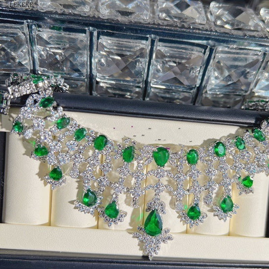 Green Waterdrops Zircon Necklace Earring Ring Bracelet Four-piece Set $362.50 Dana Fashion Color: Emerald Green Women's Accessories Product information: Material: zircon/Rhinestone Product Type: Ornament Color classification: Emerald Green Size: Necklace