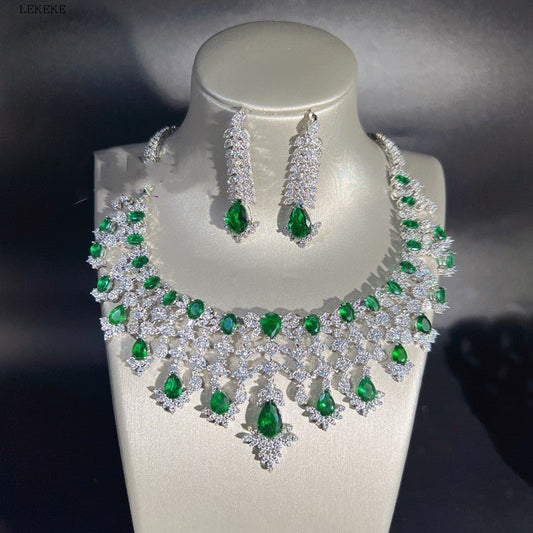 Green Waterdrops Zircon Necklace Earring Ring Bracelet Four-piece Set $362.50 Dana Fashion Color: Emerald Green Women's Accessories Product information: Material: zircon/Rhinestone Product Type: Ornament Color classification: Emerald Green Size: Necklace