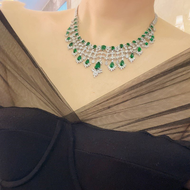 Green Waterdrops Zircon Necklace Earring Ring Bracelet Four-piece Set $362.50 Dana Fashion Color: Emerald Green Women's Accessories Product information: Material: zircon/Rhinestone Product Type: Ornament Color classification: Emerald Green Size: Necklace