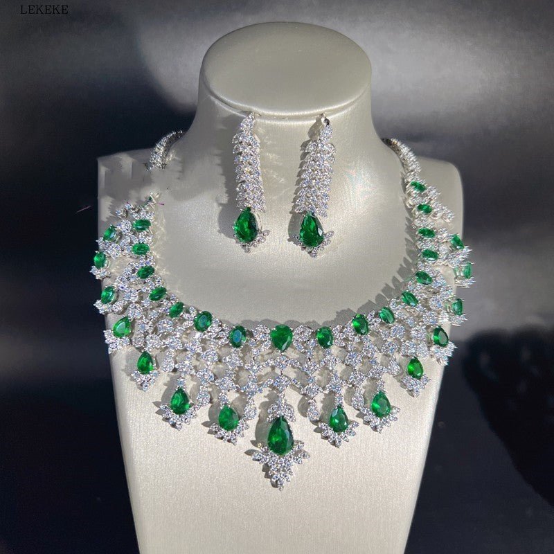 Green Waterdrops Zircon Necklace Earring Ring Bracelet Four-piece Set $362.50 Dana Fashion Color: Emerald Green Women's Accessories Product information: Material: zircon/Rhinestone Product Type: Ornament Color classification: Emerald Green Size: Necklace