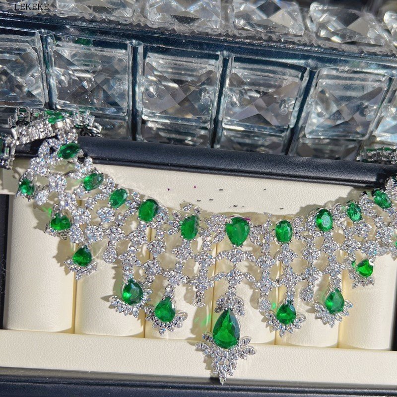 Green Waterdrops Zircon Necklace Earring Ring Bracelet Four-piece Set $362.50 Dana Fashion Color: Emerald Green Women's Accessories Product information: Material: zircon/Rhinestone Product Type: Ornament Color classification: Emerald Green Size: Necklace