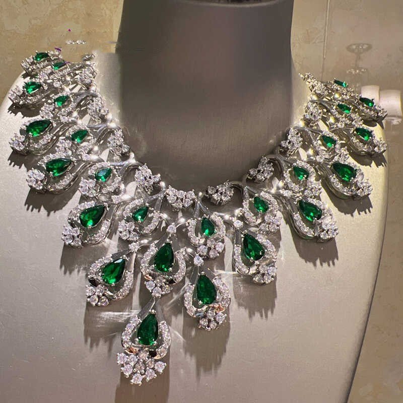 Green Zircon Evening Dress Accessories Necklace Earrings $347.50 Dana Fashion Color: Emerald Green Women's Accessories Product information: Material: zircon/Rhinestone Product Type: Ornament Color classification: Emerald Green Size: Necklace length 42cm,