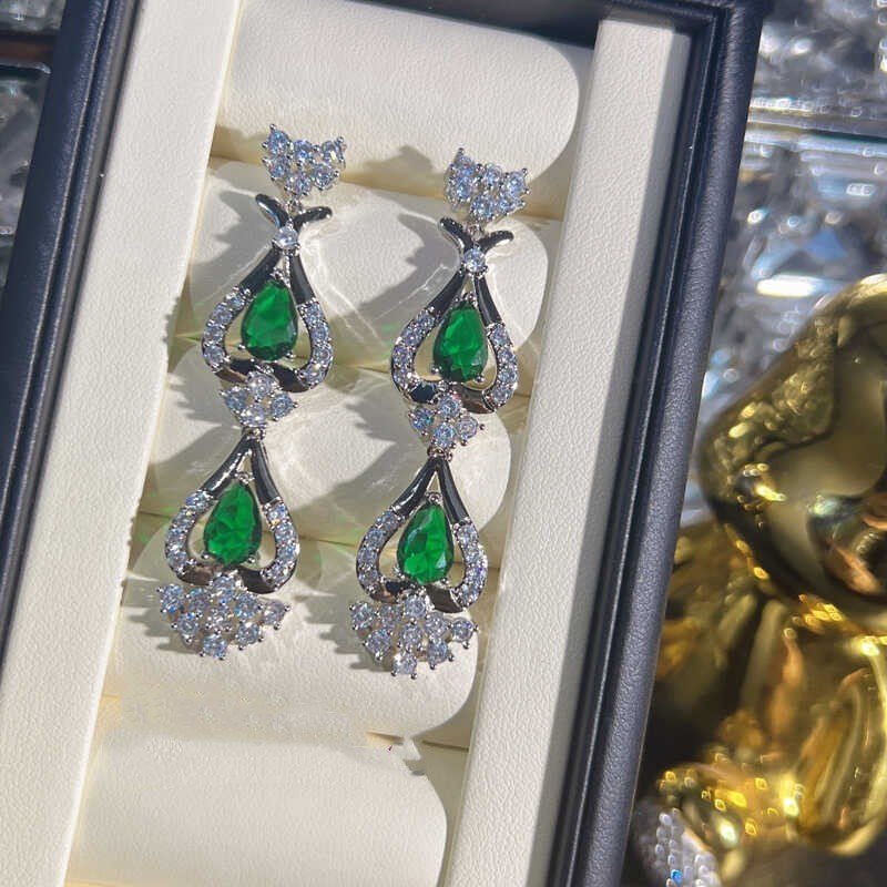 Green Zircon Evening Dress Accessories Necklace Earrings $347.50 Dana Fashion Color: Emerald Green Women's Accessories Product information: Material: zircon/Rhinestone Product Type: Ornament Color classification: Emerald Green Size: Necklace length 42cm,