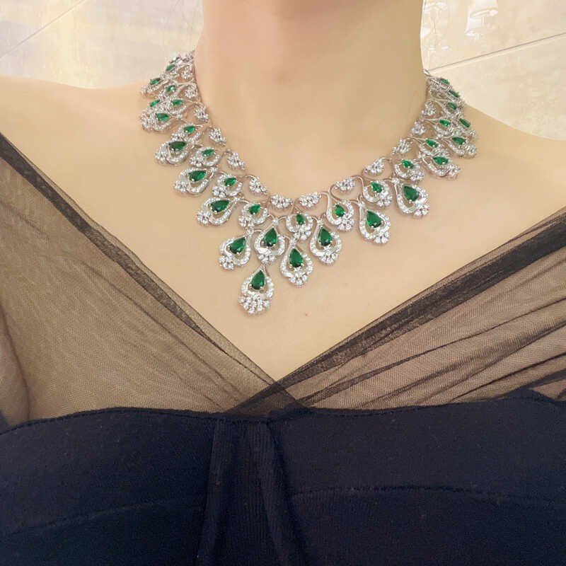 Green Zircon Evening Dress Accessories Necklace Earrings $347.50 Dana Fashion Color: Emerald Green Women's Accessories Product information: Material: zircon/Rhinestone Product Type: Ornament Color classification: Emerald Green Size: Necklace length 42cm,