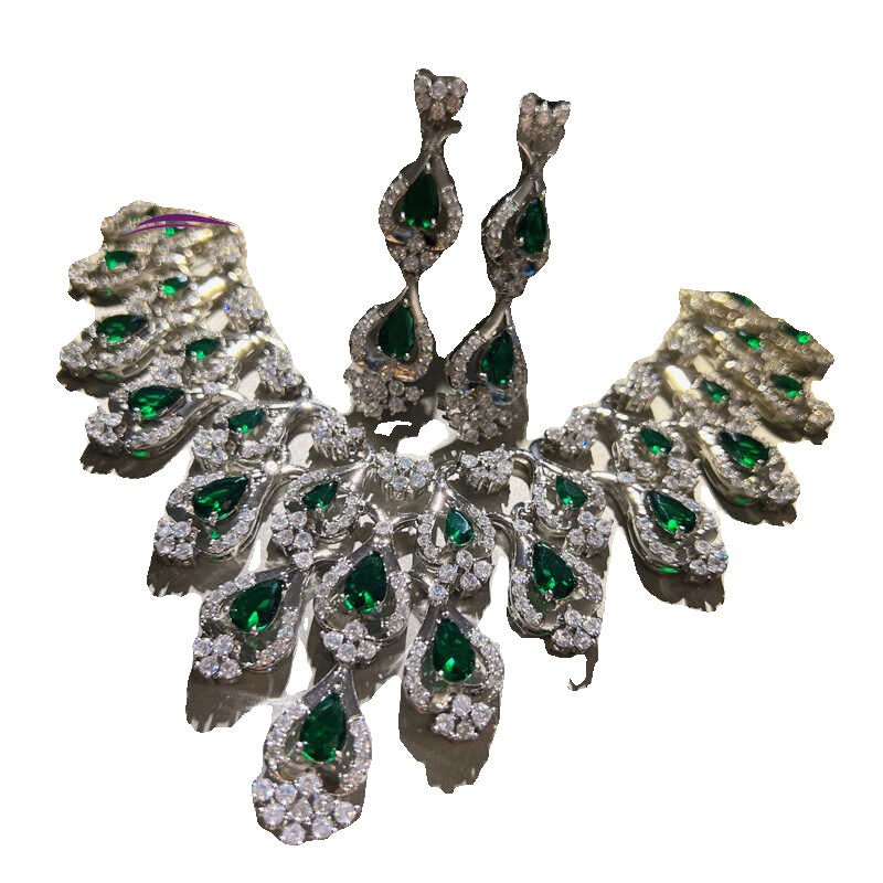 Green Zircon Evening Dress Accessories Necklace Earrings $347.50 Dana Fashion Color: Emerald Green Women's Accessories Product information: Material: zircon/Rhinestone Product Type: Ornament Color classification: Emerald Green Size: Necklace length 42cm,
