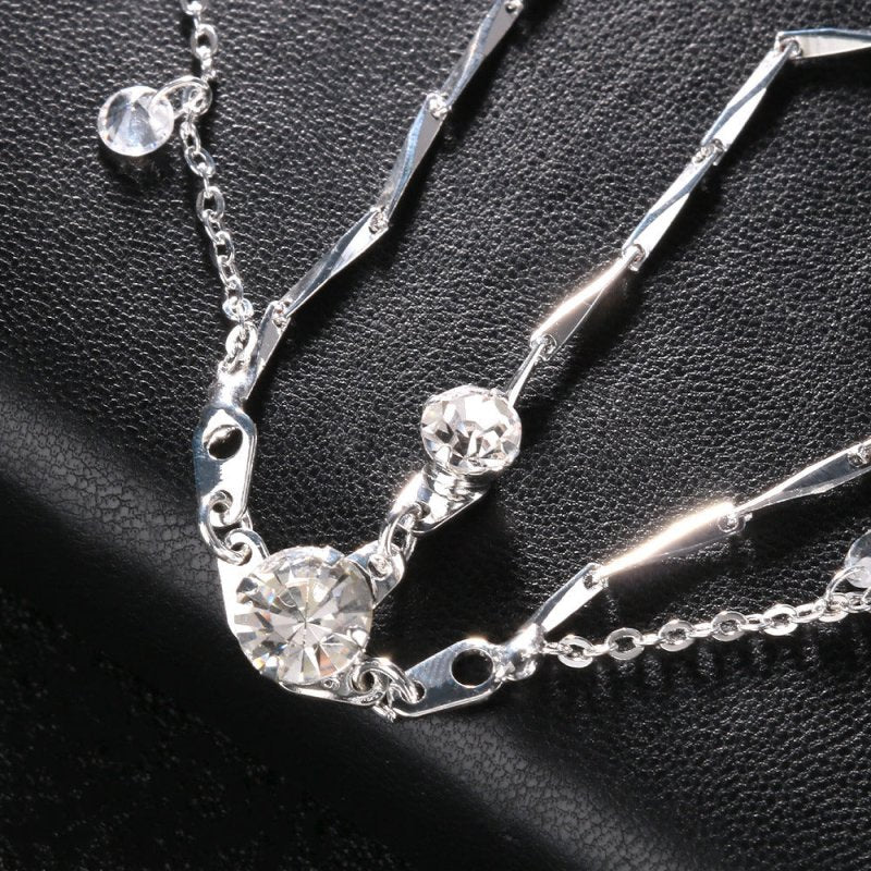 Hair Chain High-grade Rhinestone Pendant Headdress Simple Accessories $33.93 Dana Fashion Color: Gold Women's Accessories Product information: Color: gold, silver Material: Rhinestone Popular elements: water droplets Style: European and American Packing l