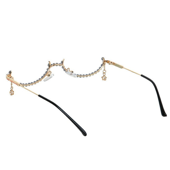 Half-rimmed glasses $25.00 Dana Fashion Color: AB drill Women's Accessories Model: 9021B Material: Alloy