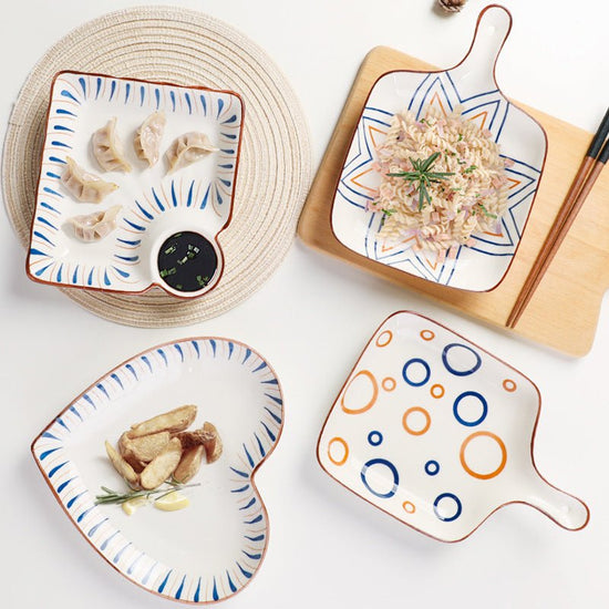 Hand Painted Bakeware Heart Shaped Plate Square Dumpling Plate $19.50 Dana Fashion style: A Size: 7inches Dana's Kitchen Product information: Ceramic plate Material: Porcelain Style: Chinese Shape: Irregular shape Microwave: available Surface technology:
