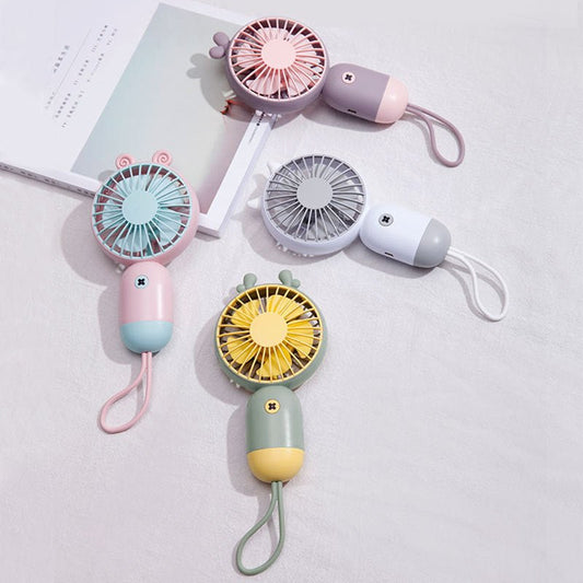 Handheld portable mini fan $38.12 Dana Fashion Color: Green Toys & Hobbies Product name: cute hand-held fan Rated voltage: 3.7V Rated power: 1.5W Battery capacity: 500mAh Material: ABS + silicone Charging time: 2 hours Working time: 2.5-4 hours (depending