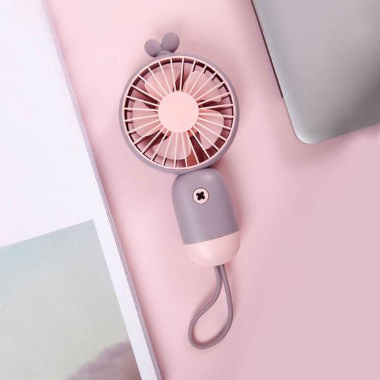 Handheld portable mini fan $38.12 Dana Fashion Color: Green Toys & Hobbies Product name: cute hand-held fan Rated voltage: 3.7V Rated power: 1.5W Battery capacity: 500mAh Material: ABS + silicone Charging time: 2 hours Working time: 2.5-4 hours (depending