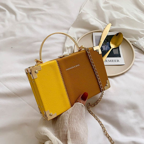 Handle Box Design Ladies Party Clutch Bag Purses $34.93 Dana Fashion Color: Yellow Women's Bags Material : PU-artificial leather Size : Length 7.48 in/19cm Width 1.97 in/5cm Height 4.72 in/12cm Weight: 0.47kg with a long chain