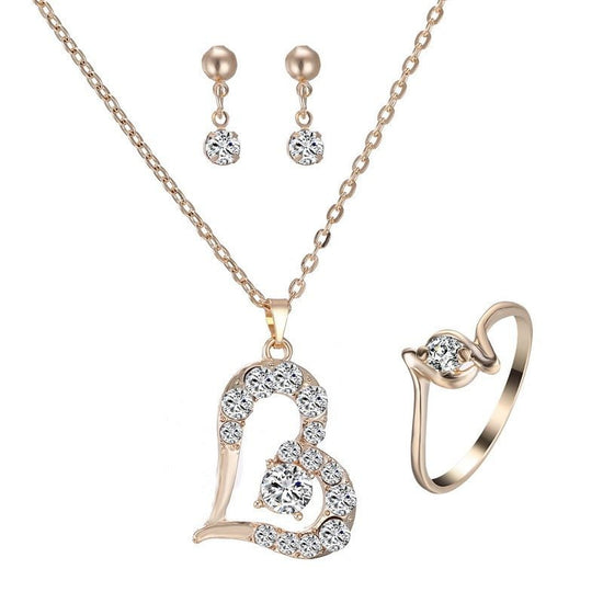 Heart Pendant Jewelry Set Rhinestone Jewellery $21.99 Dana Fashion Color: A Women's Accessories Product material: alloy Product size: pendant 30 * 22mm, earring 14 * 4mm, ring diameter 20mm Product chain: 42cm