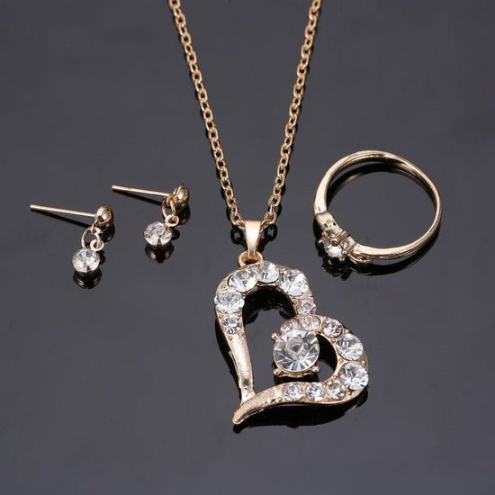 Heart Pendant Jewelry Set Rhinestone Jewellery $21.99 Dana Fashion Color: A Women's Accessories Product material: alloy Product size: pendant 30 * 22mm, earring 14 * 4mm, ring diameter 20mm Product chain: 42cm